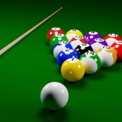 In a game of pool the cue ball strikes